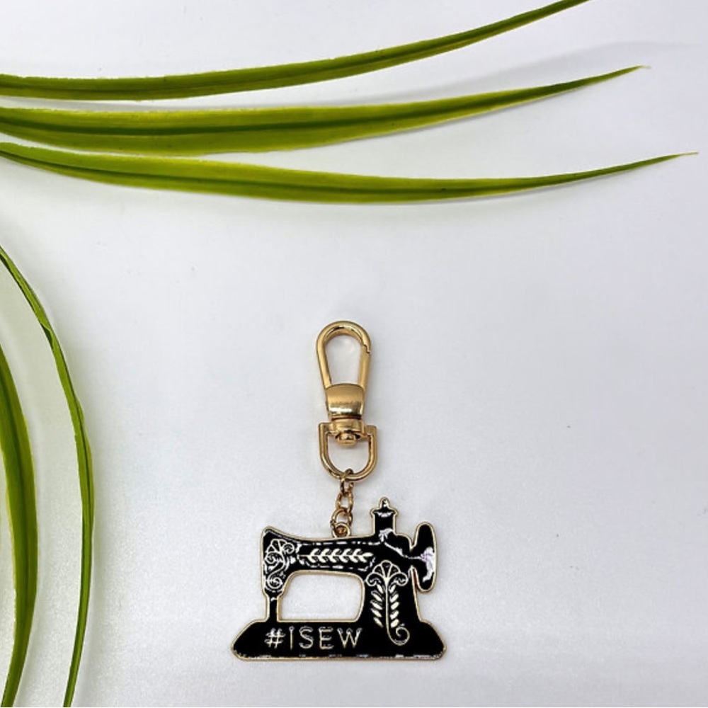 Elegant Black and Gold Sewing Machine Keychain